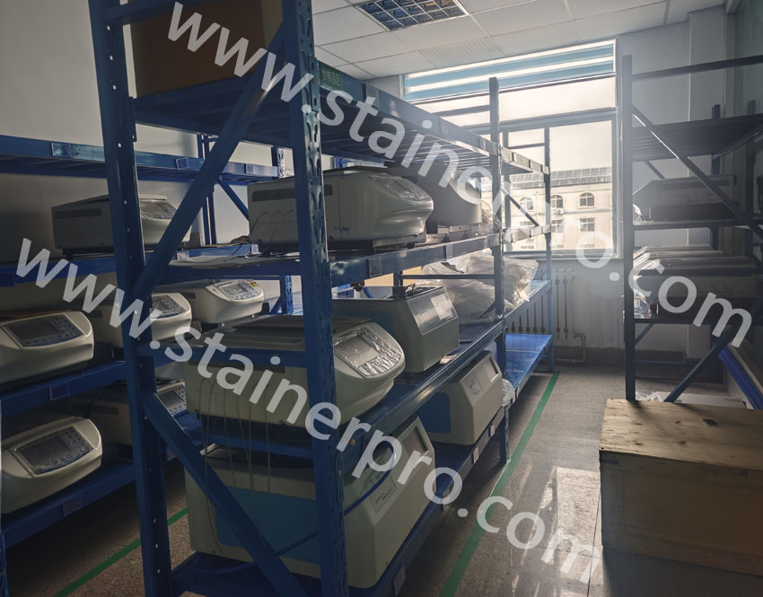 Overview of our shipping warehouse stocked with finished automatic slide stainers