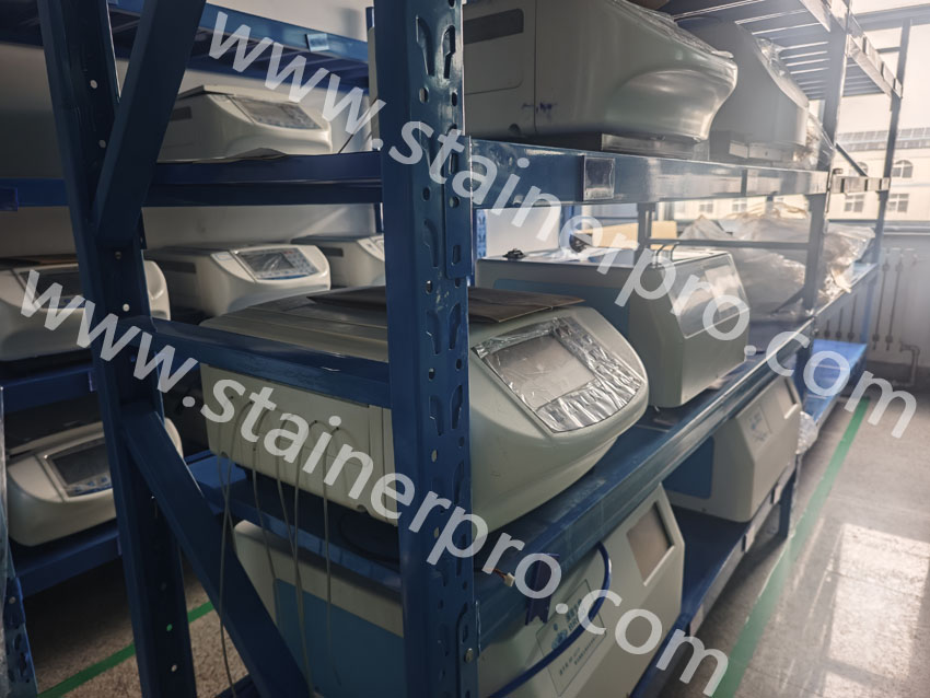 Stocked automatic slide stainers ready for packing and global shipment
