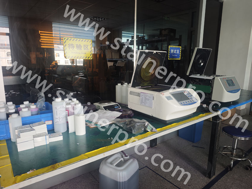 Testing zone for performance verification of automatic slide stainers